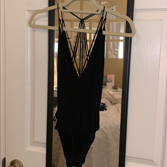 Urban Outfitters Tops - Low front strap bodysuit Urban Outfitters Tops - Low front strap bodysuit